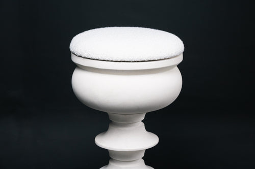 Baluster barstool in white. The base stacks three softly rounded bulbous forms. A broad domed foot, a mid sphere, and an upper globe, connected by a narrow collar, and topped with a wide disc and round white bouclé upholstered seat.